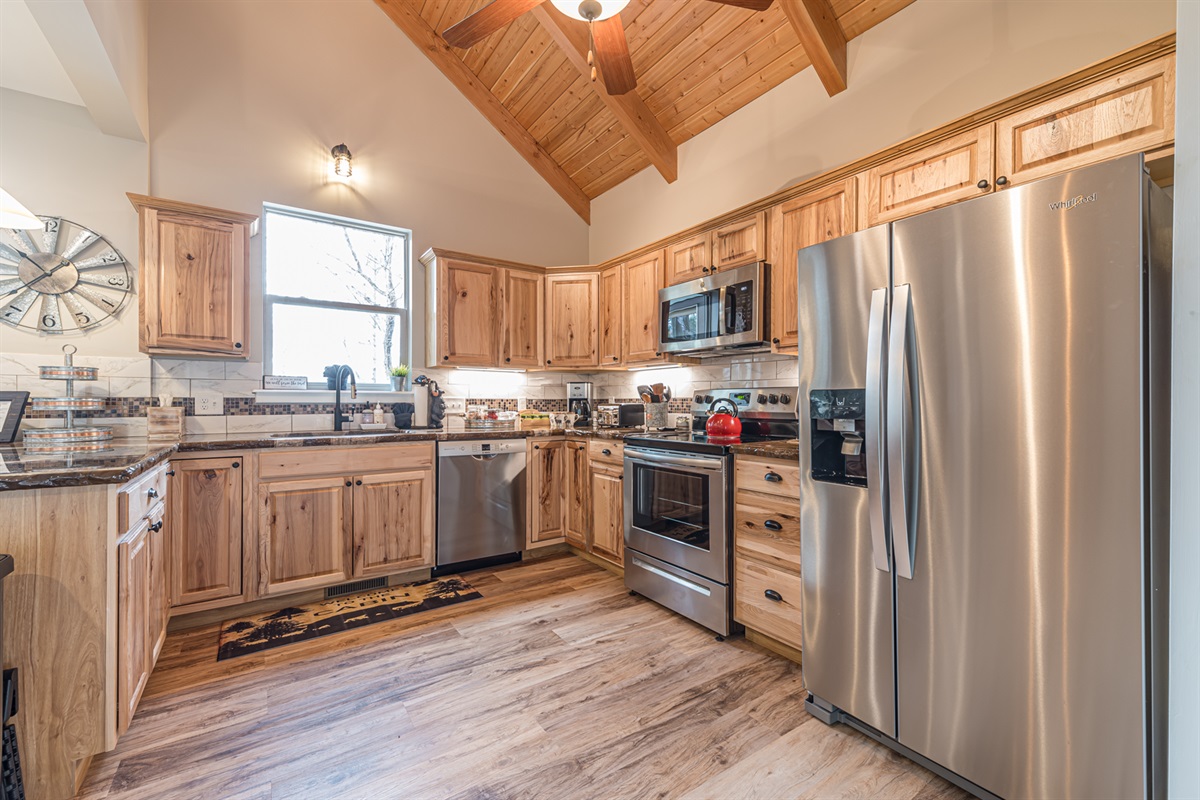 Custom Kitchen with Stainless Appliances Ready for Enteratining