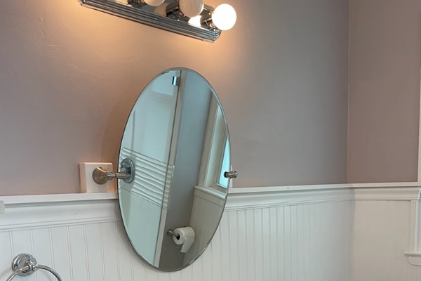 The second bathroom can be accessed from the hallway or the bedroom, and is completely renovated with a new shower.