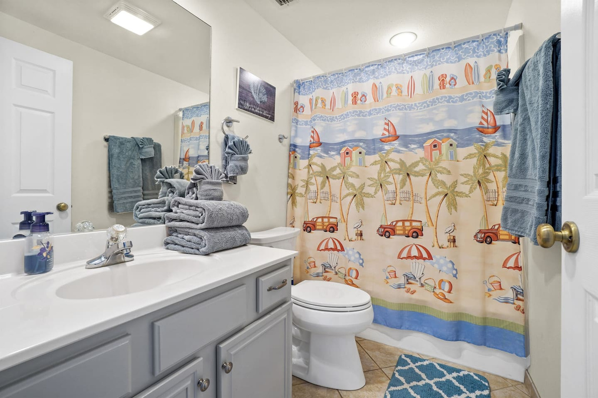 Go ahead and rinse off in the main level full bath &mdash; convenient for everyone on the ground floor.