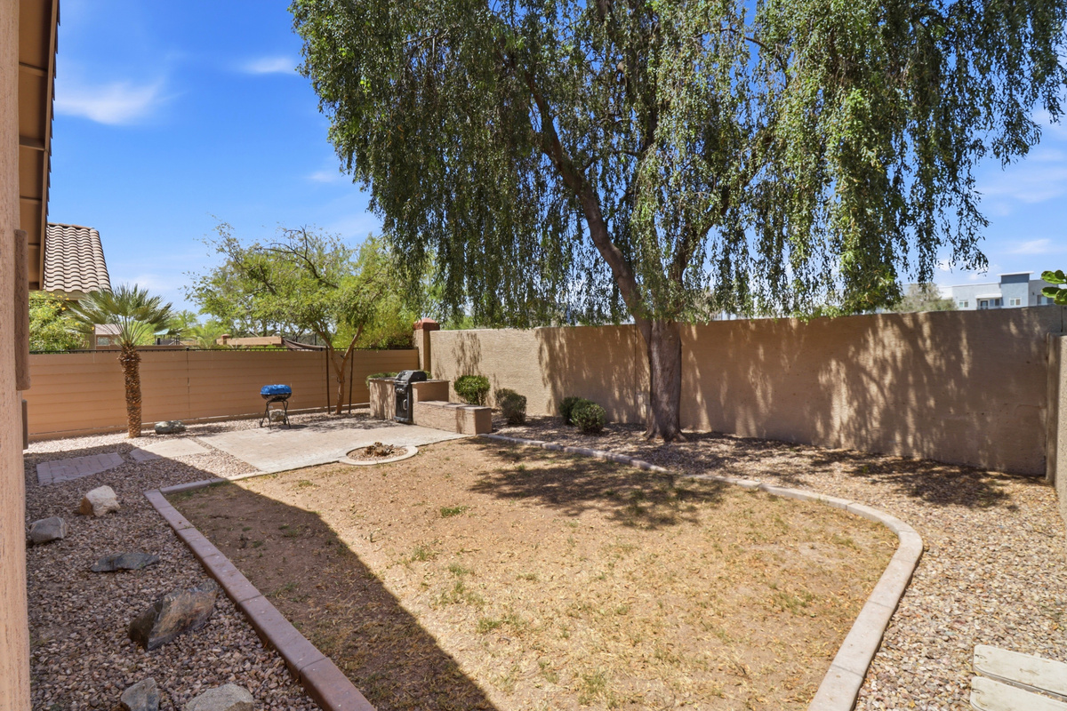 Front exterior with driveway parking for up to 2 cars and a private entrance.
