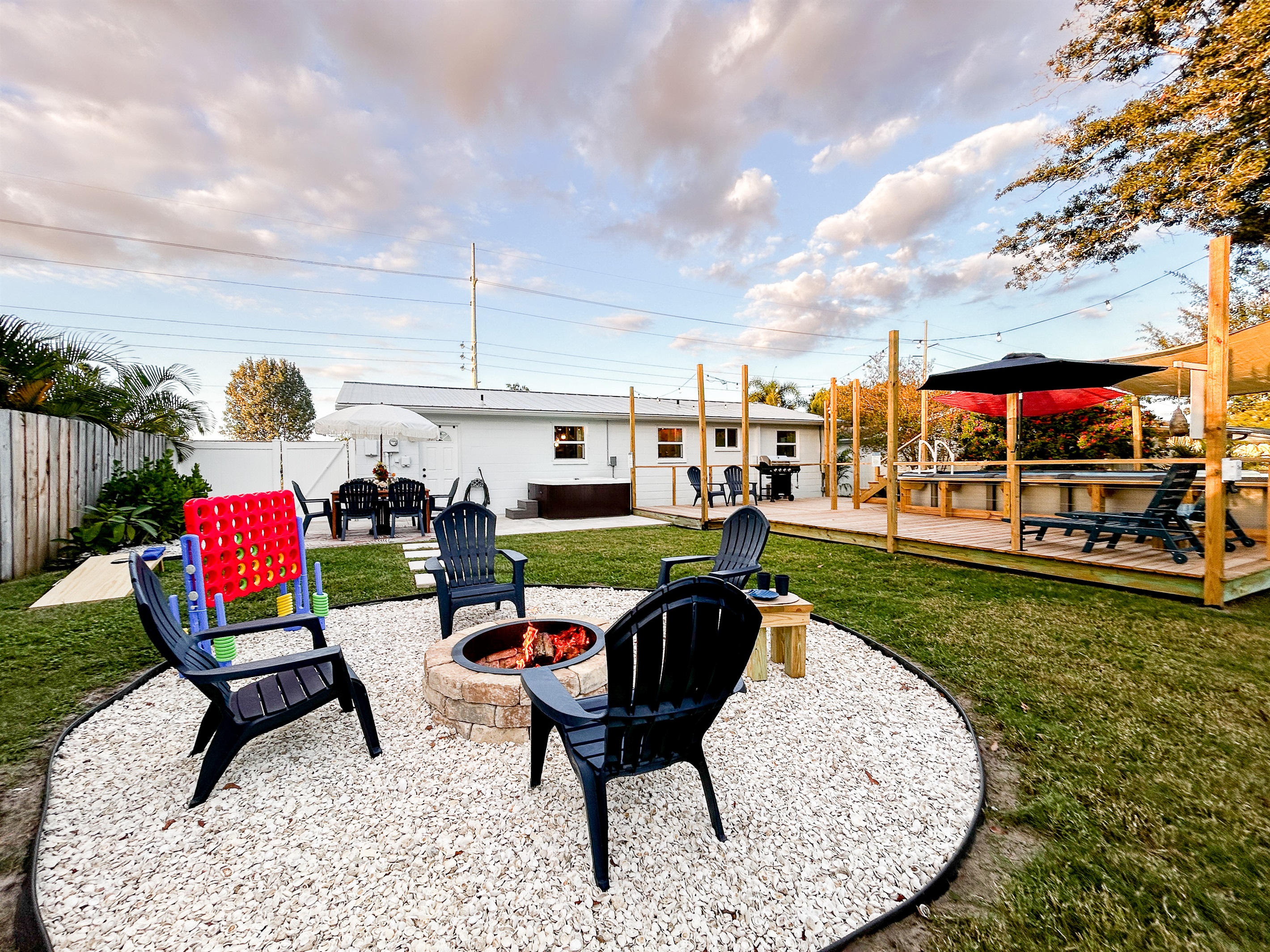 Fire Pit & Seating, Patio Table with Umbrella, Hot Tub & Yard