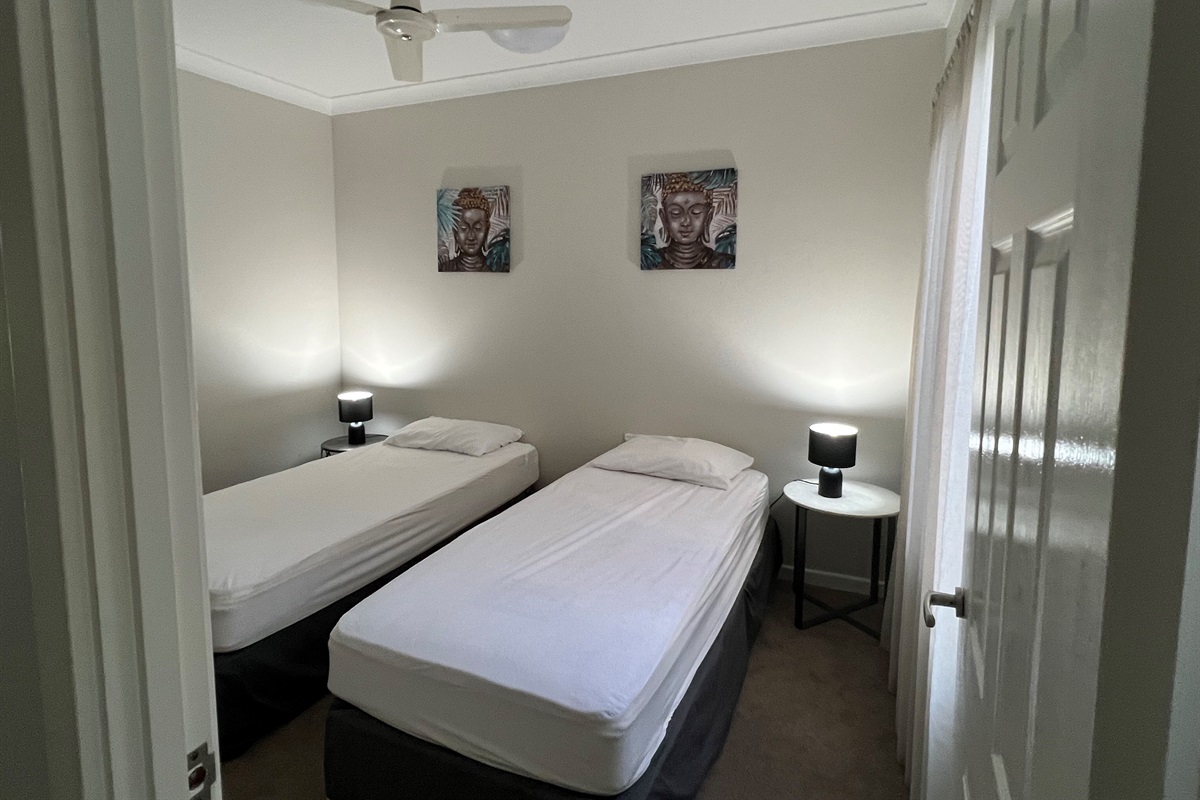 Bedroom Three features 2 King Single Beds & Built-in robe