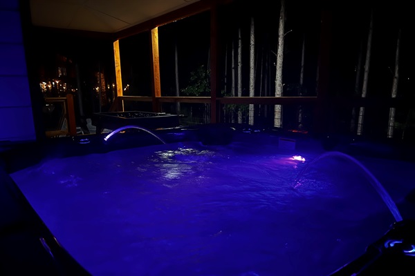 Relax in the bubbly hot tub located at the back of the deck. 