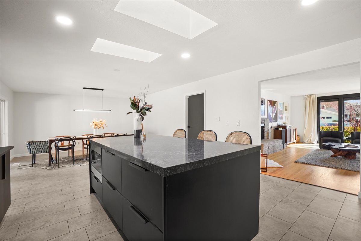 Fully equipped and thoughtfully designed, the kitchen features modern appliances, generous counter space, and everything needed to prepare meals during your stay.