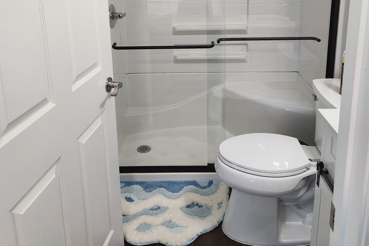 Clean, modern, and thoughtfully designed, this bathroom offers a refreshing space to start and end your day.
