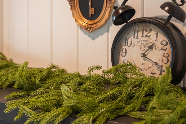 Soft winter greens, twinkling lights and layered textures, and a glow that feels just right for this time of year.