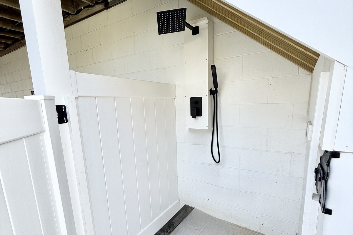 Rinse off in style after a day at the beach in our private outdoor shower—complete with a refreshing rainfall showerhead and stunning water views.