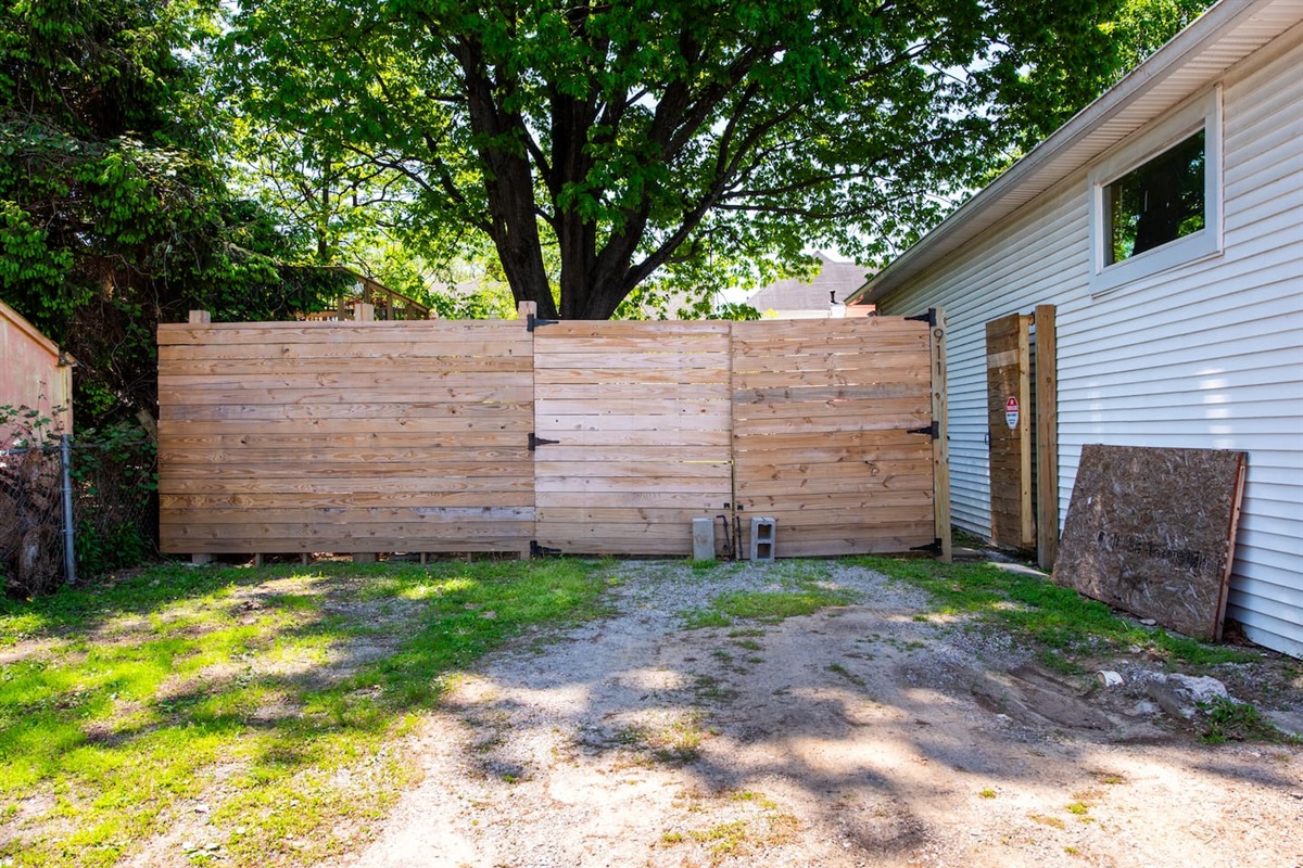 Parking area in the back. Enter from Barret Ave or the alley. 