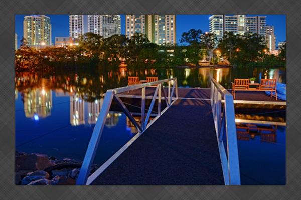 Private jetty views toward the Surfers Paradise skyline from your Paradise Island waterfront retreat.