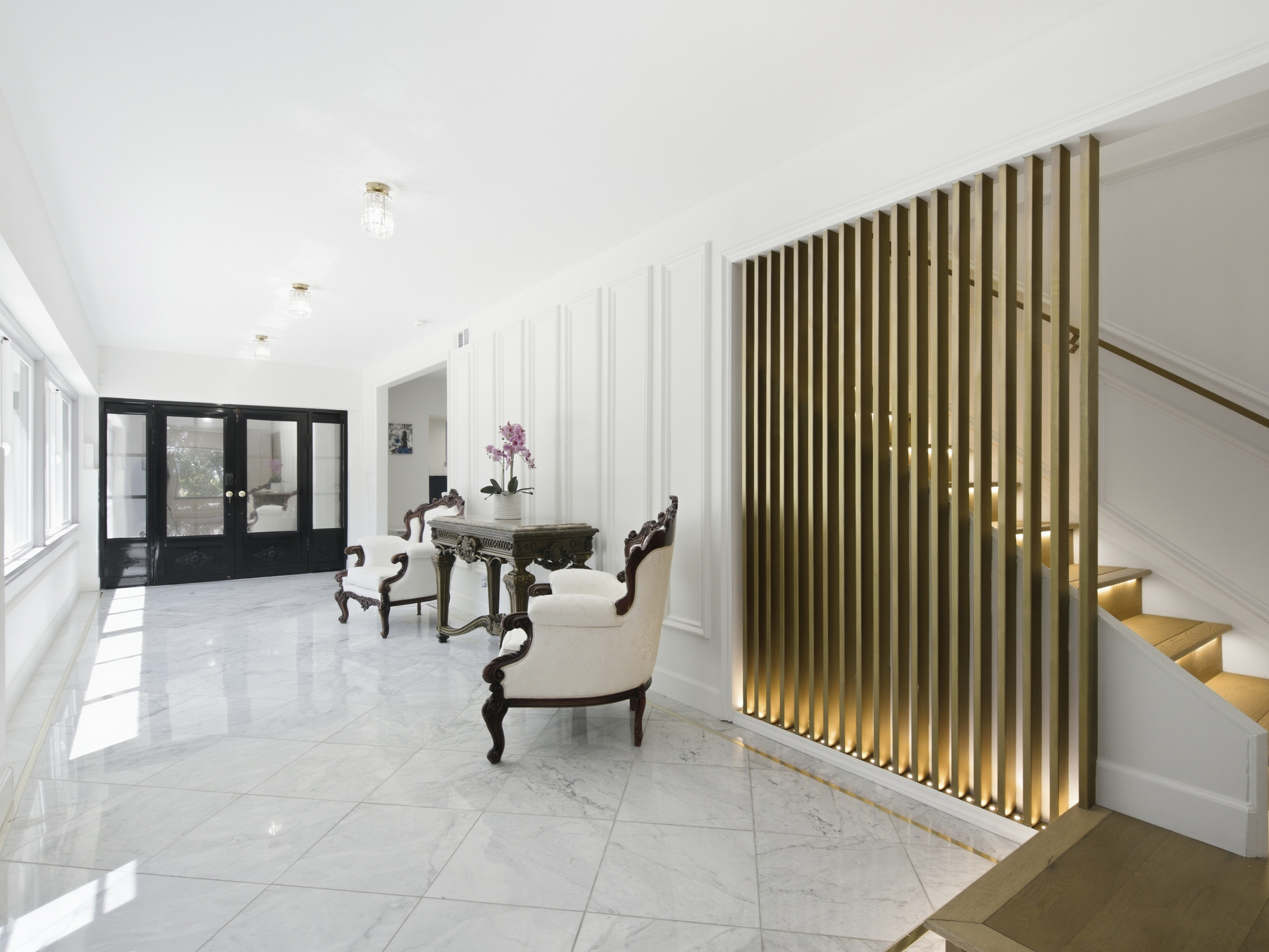Elegant from every angle, this beautifully designed staircase brings a sophisticated touch to the space.