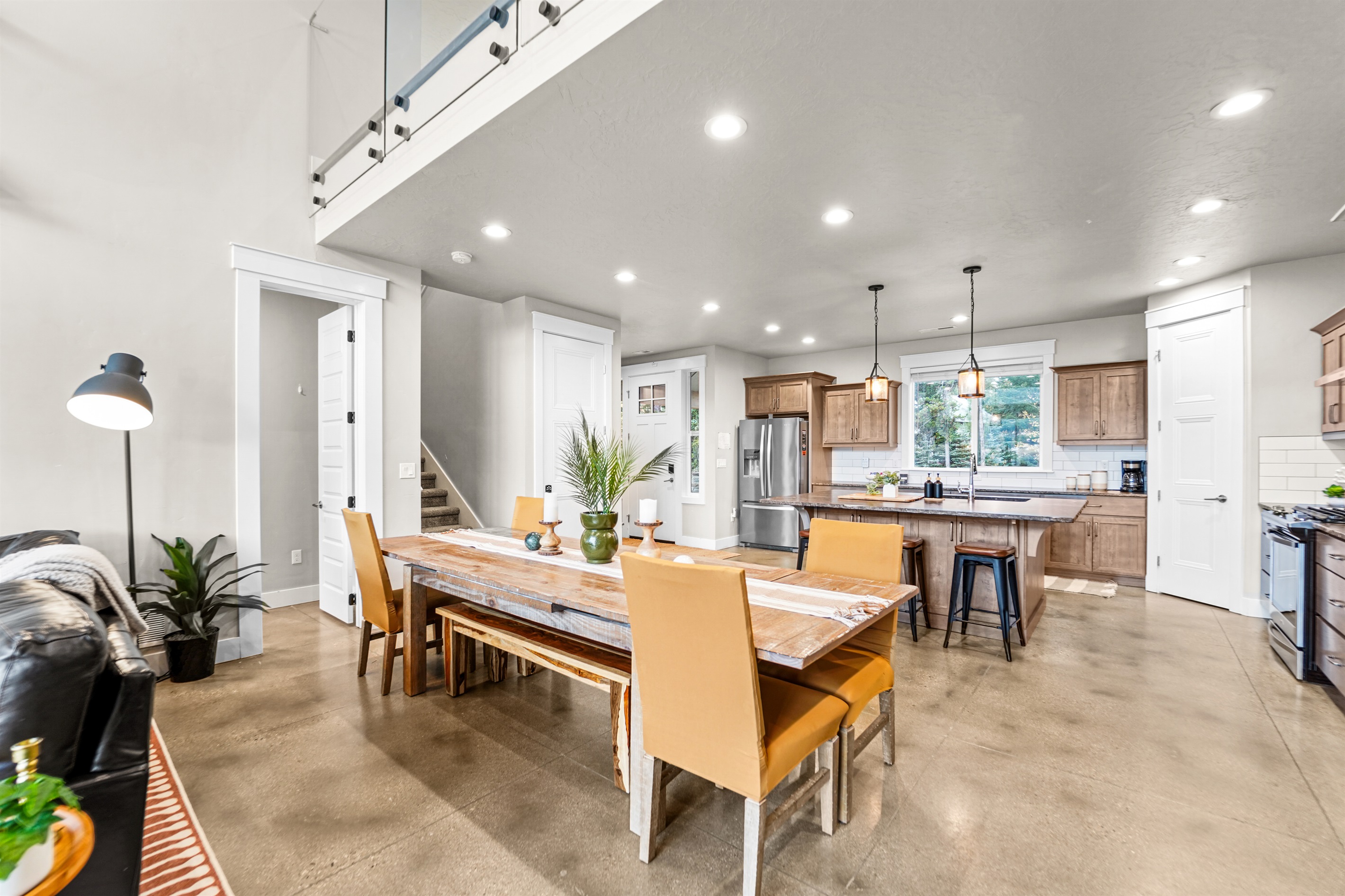 Modern design, high ceilings, and perfect flow from dining to kitchen.