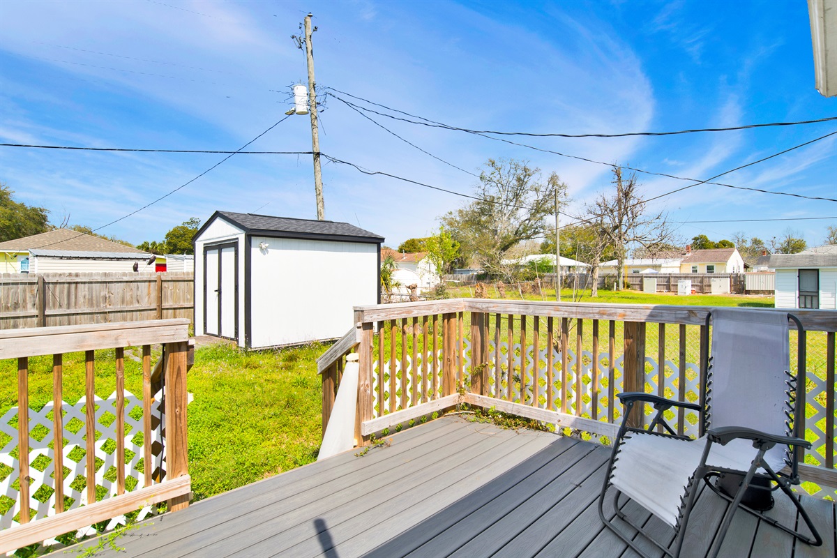 Enjoy morning coffee or evening beverages on the backyard deck. Backyard is fenced in.