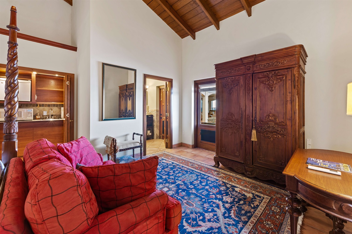 This bedroom suite has a small kitchenette and an ensuite bathroom.