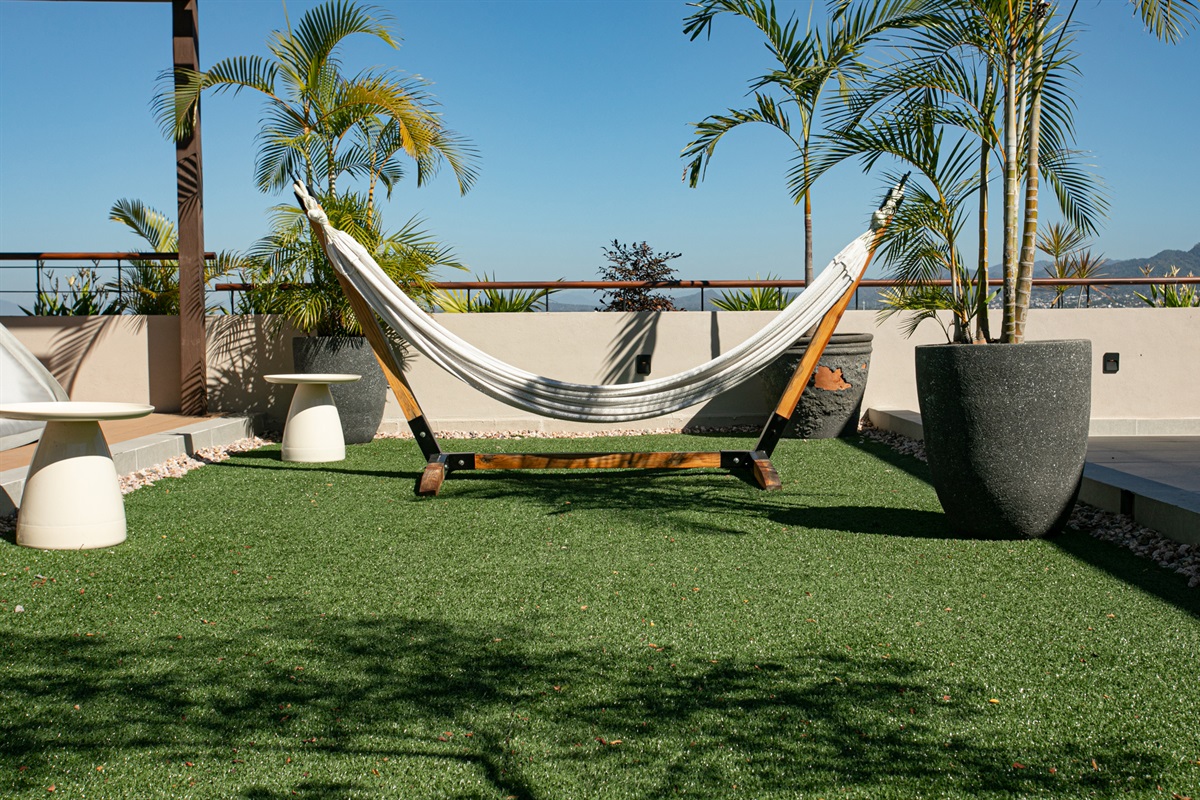 Swing & snooze the day away in the rooftop hammock.