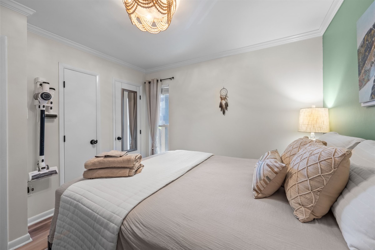 Unwind in a cozy, thoughtfully designed space after a day at the beach