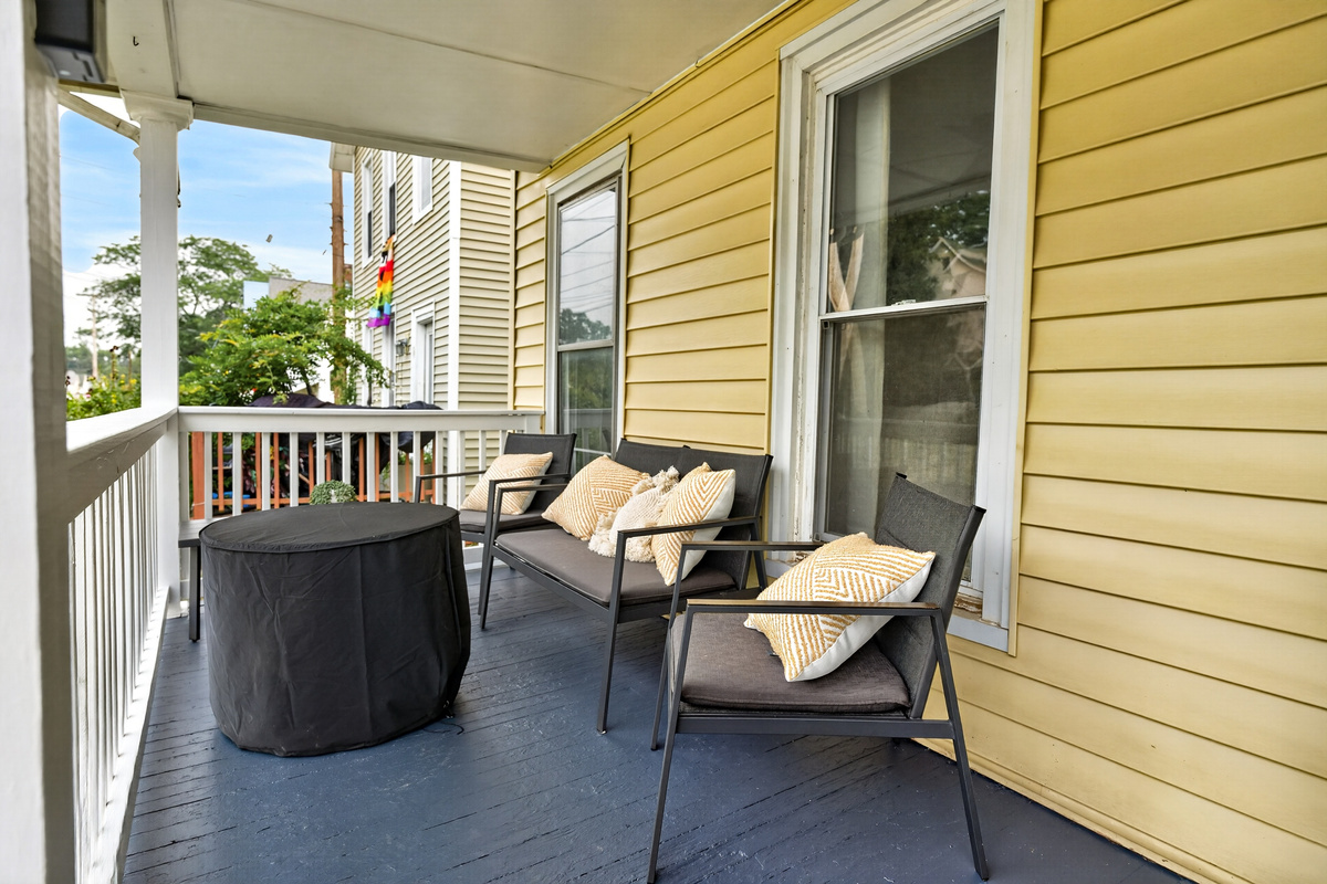 Porch seating beside the front windows