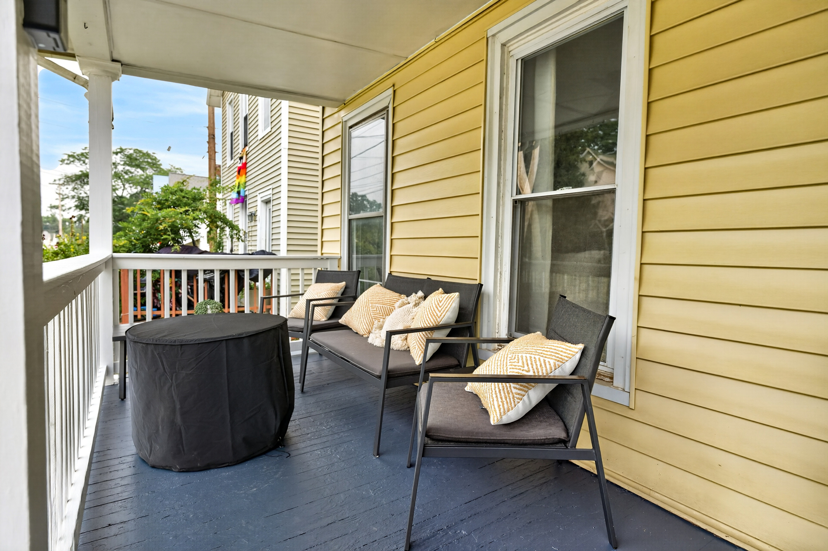 Porch seating beside the front windows