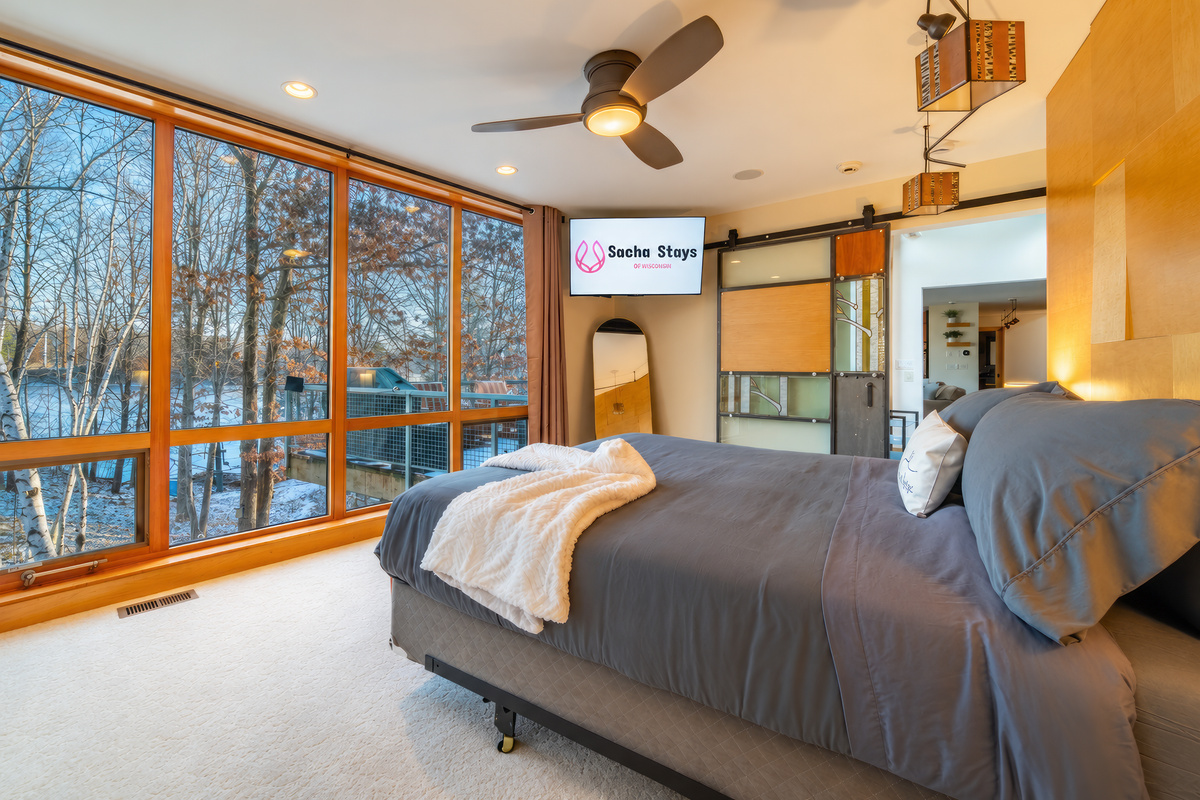 Imagine waking up to these amazing lake views from the floor to ceiling windows!