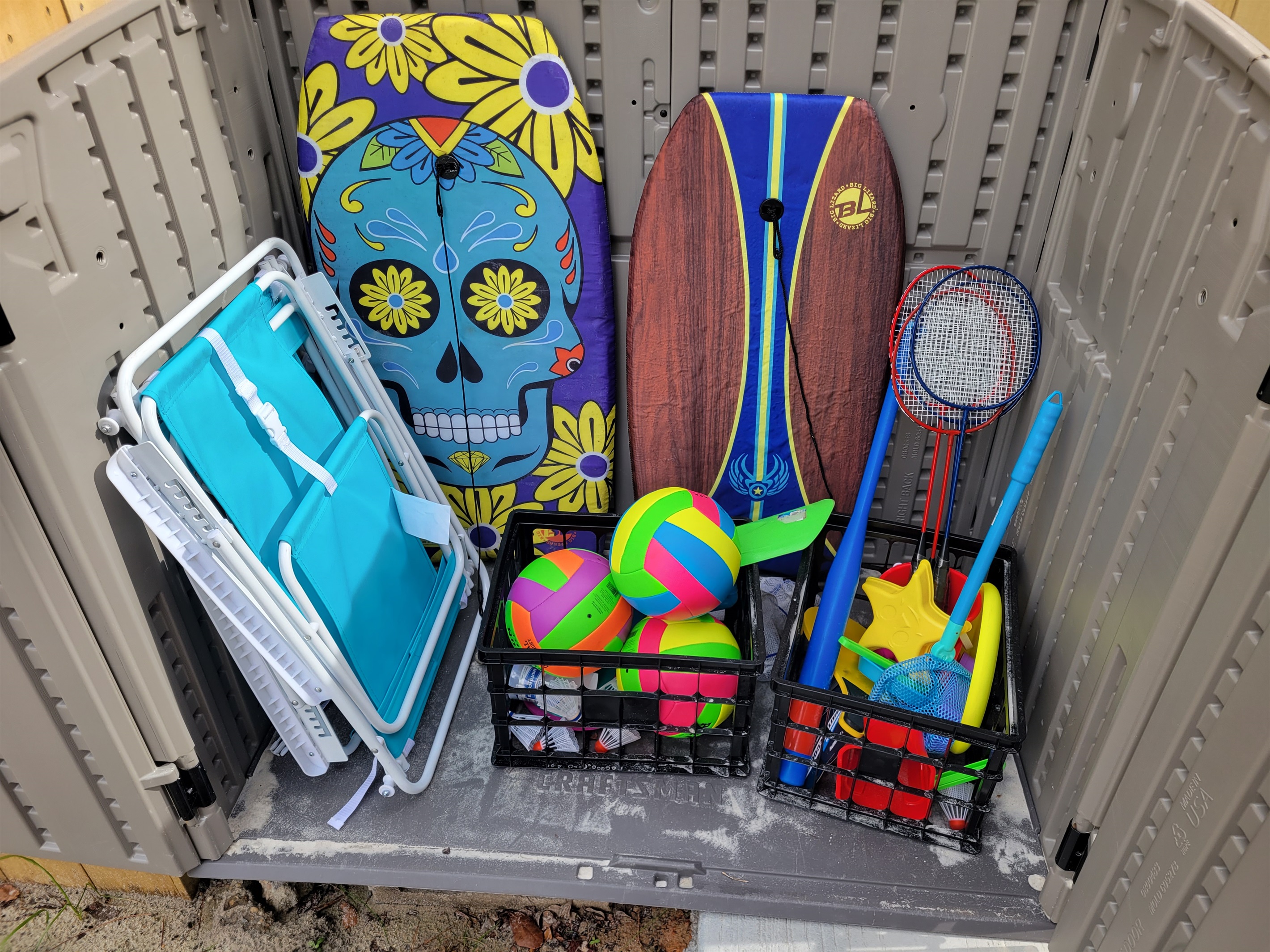 Ready for beach day? Us too! Grab chairs and toys from the patio box for all your beach fun.