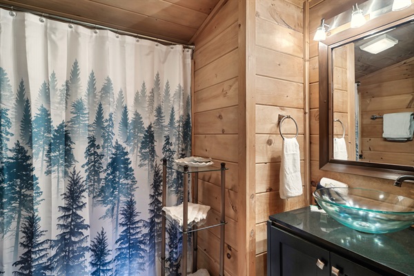 Upstairs bathroom with traditional tub/shower combination