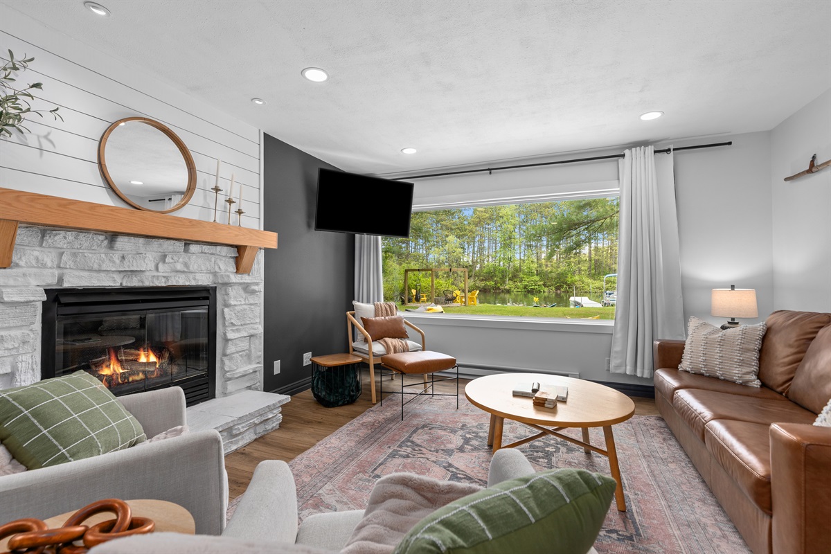 Large windows bring the beauty of the outdoors in, creating a bright and relaxing space.
