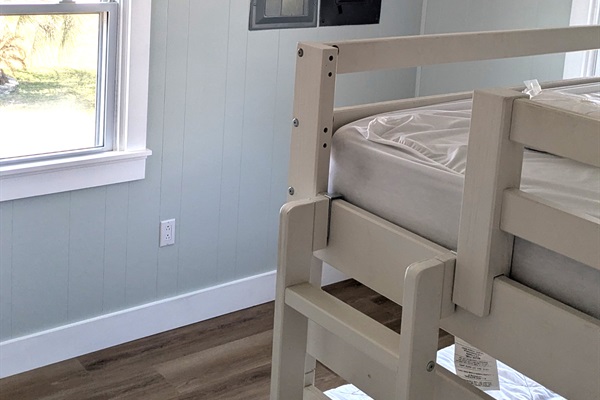 A good sized dresser will soon be added to this room.