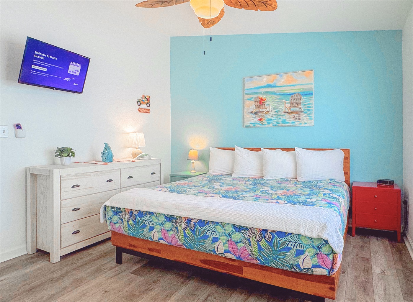 Master bedroom with comfortable king bed.