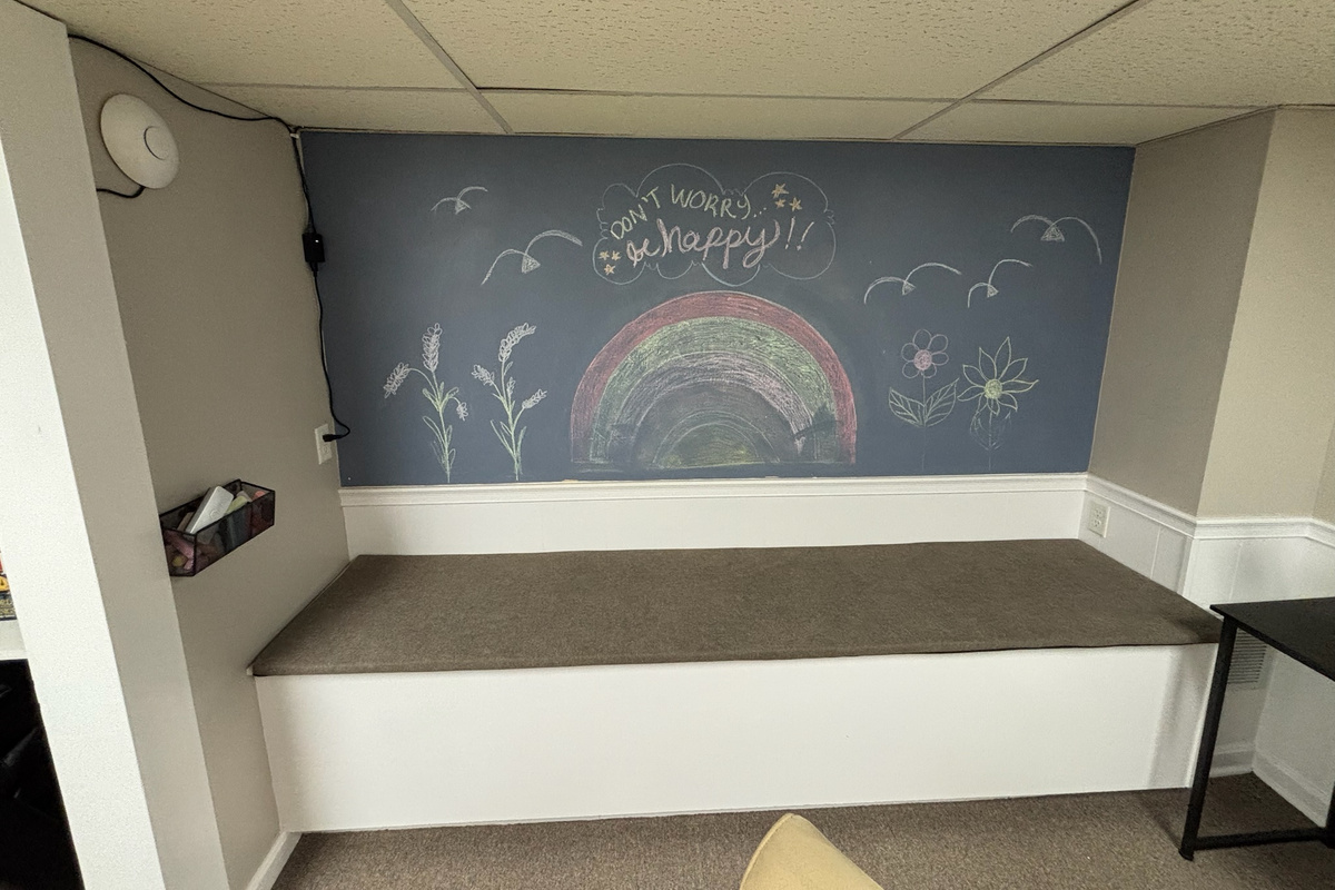 Chalkboard wall gives children and creative adults a place to leave their mark.