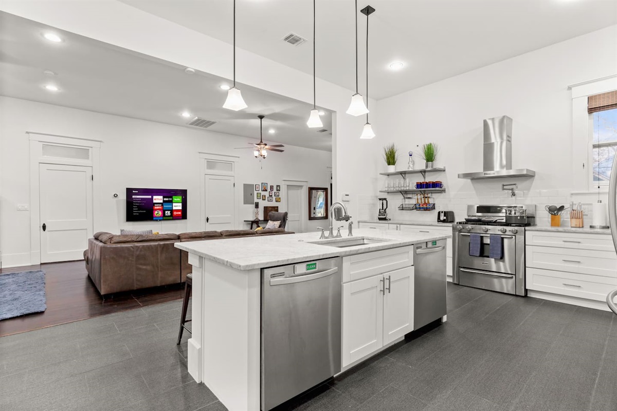 Whether you're whipping up breakfast or enjoying a snack, our spacious kitchen with a welcoming island is the gathering spot for food, fun, and conversation.