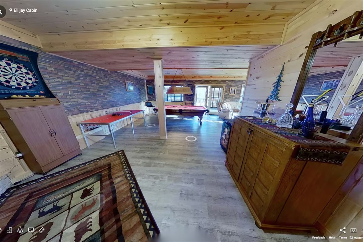 Main games room with pool table, ping pong pac man etc.