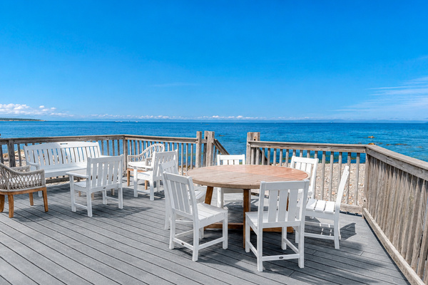 Dine, unwind, and take in sweeping ocean views from the spacious waterfront deck.
