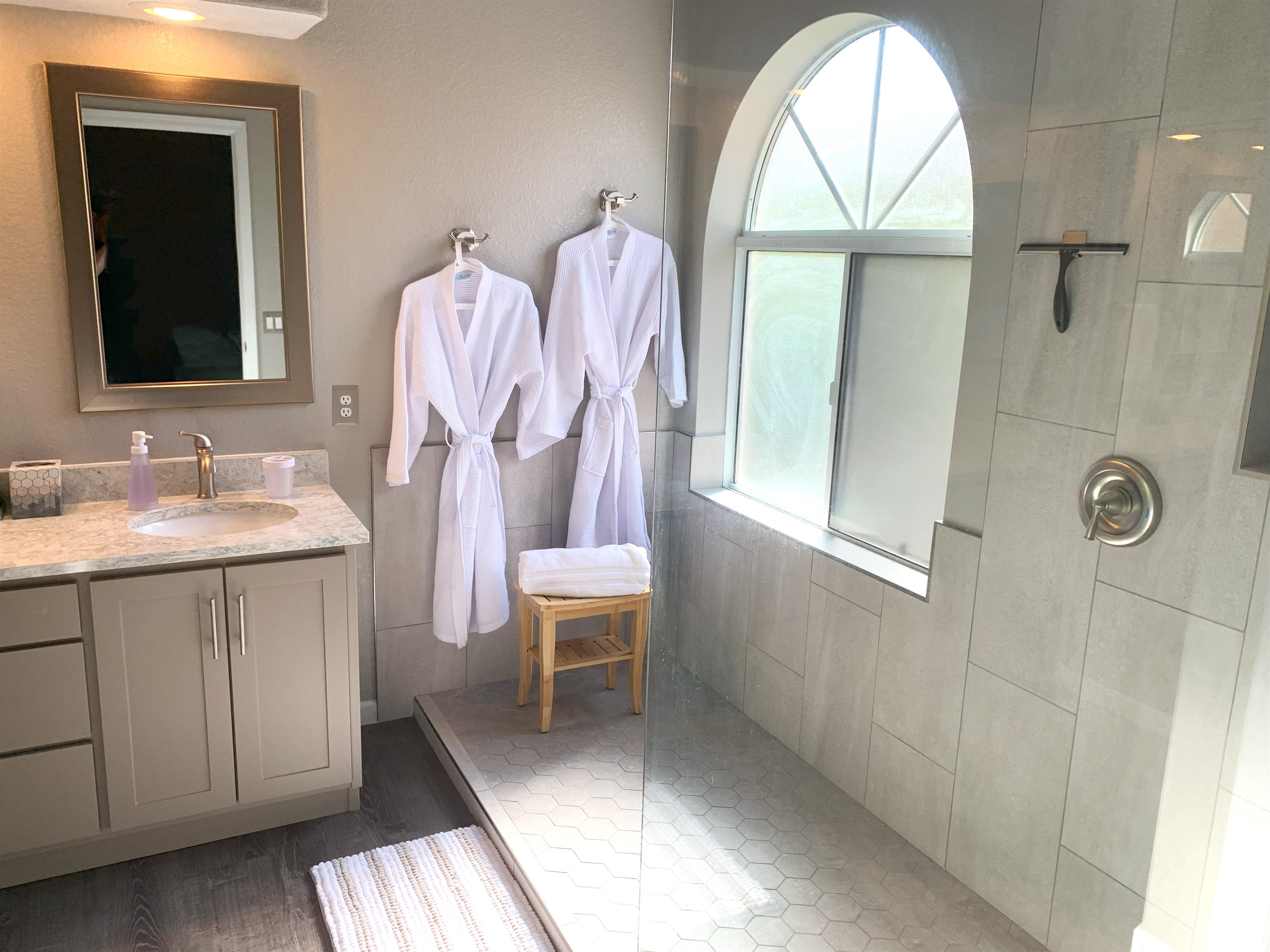 Pamper yourself in the custom shower and then slip on a comfortable robe.
