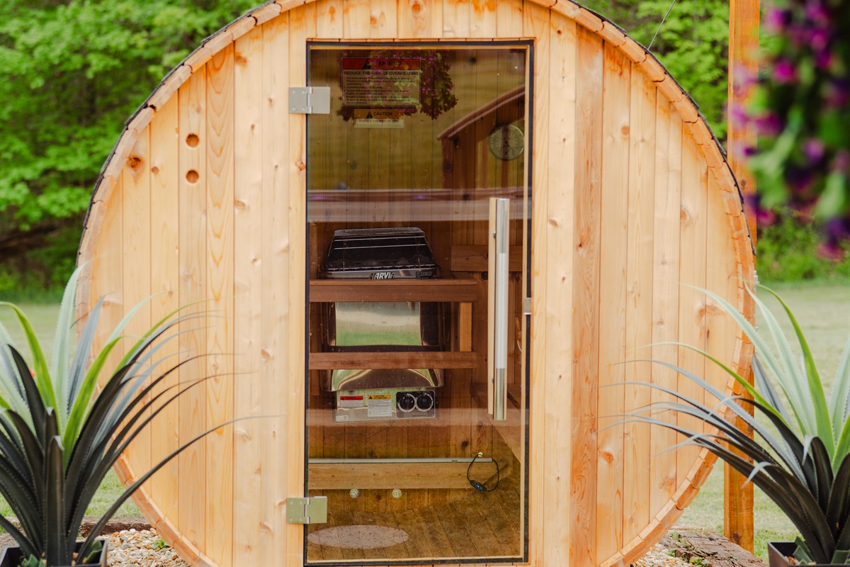 Warm up in the outdoor barrel sauna