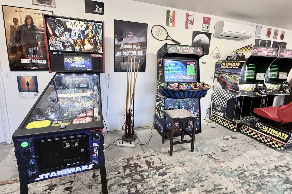 The games room complete with Star Wars pinball, 4000-game arcade and dual arcade racers