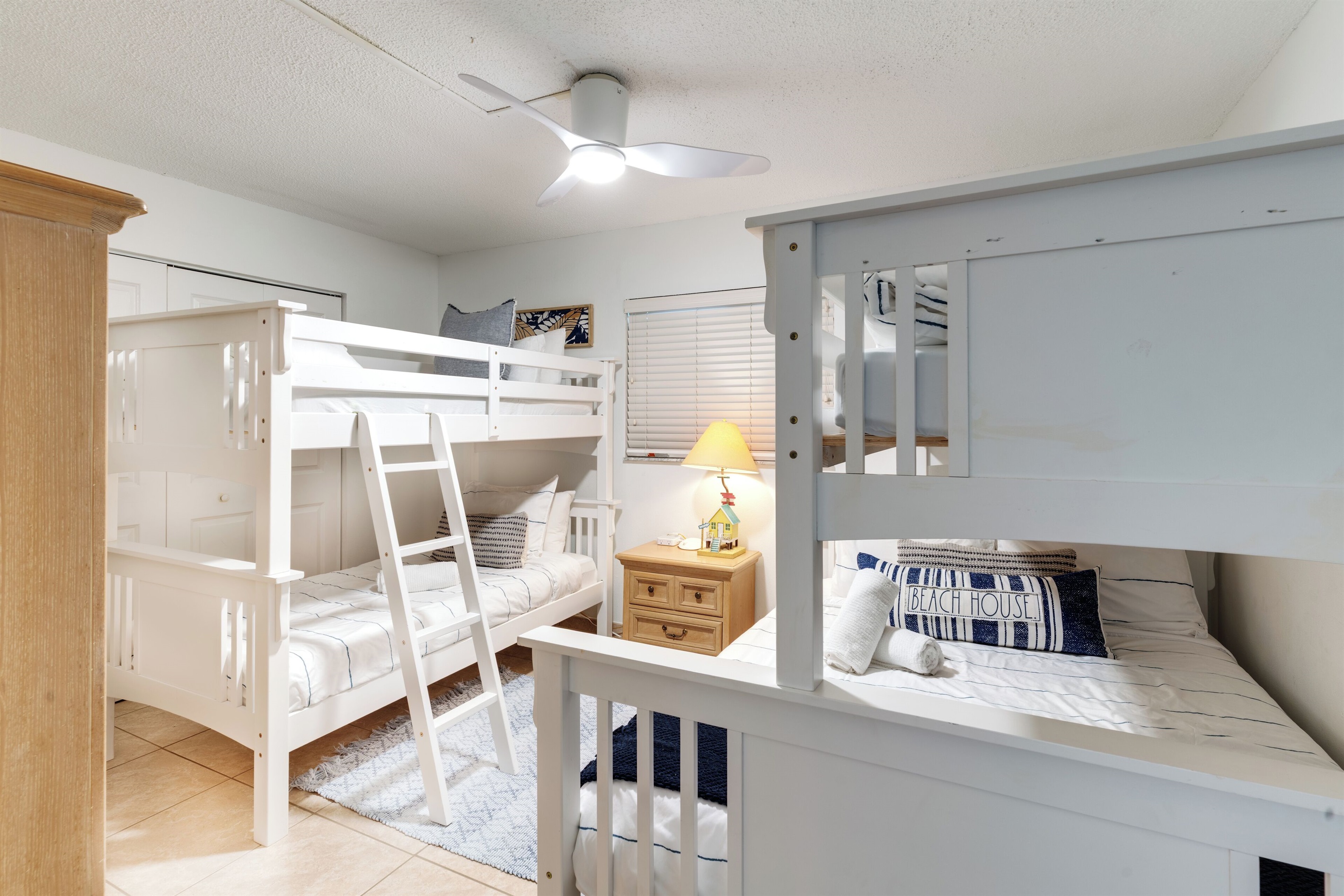 This second room has 4 beds! XL Twin over Queen, and a Twin Bunk Bed. TV too.