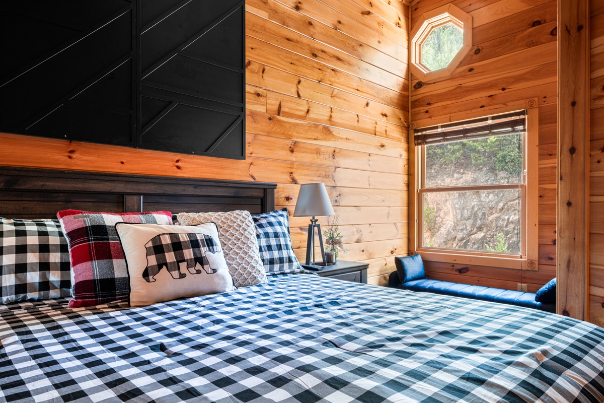There is a small closet in the corner of The Cedar Suite as well as a TV across from the bed.