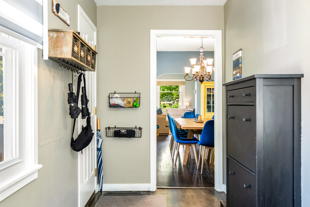 Group travel made easy. Drop your bags, hang up your coats, and settle right in—this wide, organized mudroom ensures the entryway stays clutter-free while everyone gathers in the adjacent living areas.