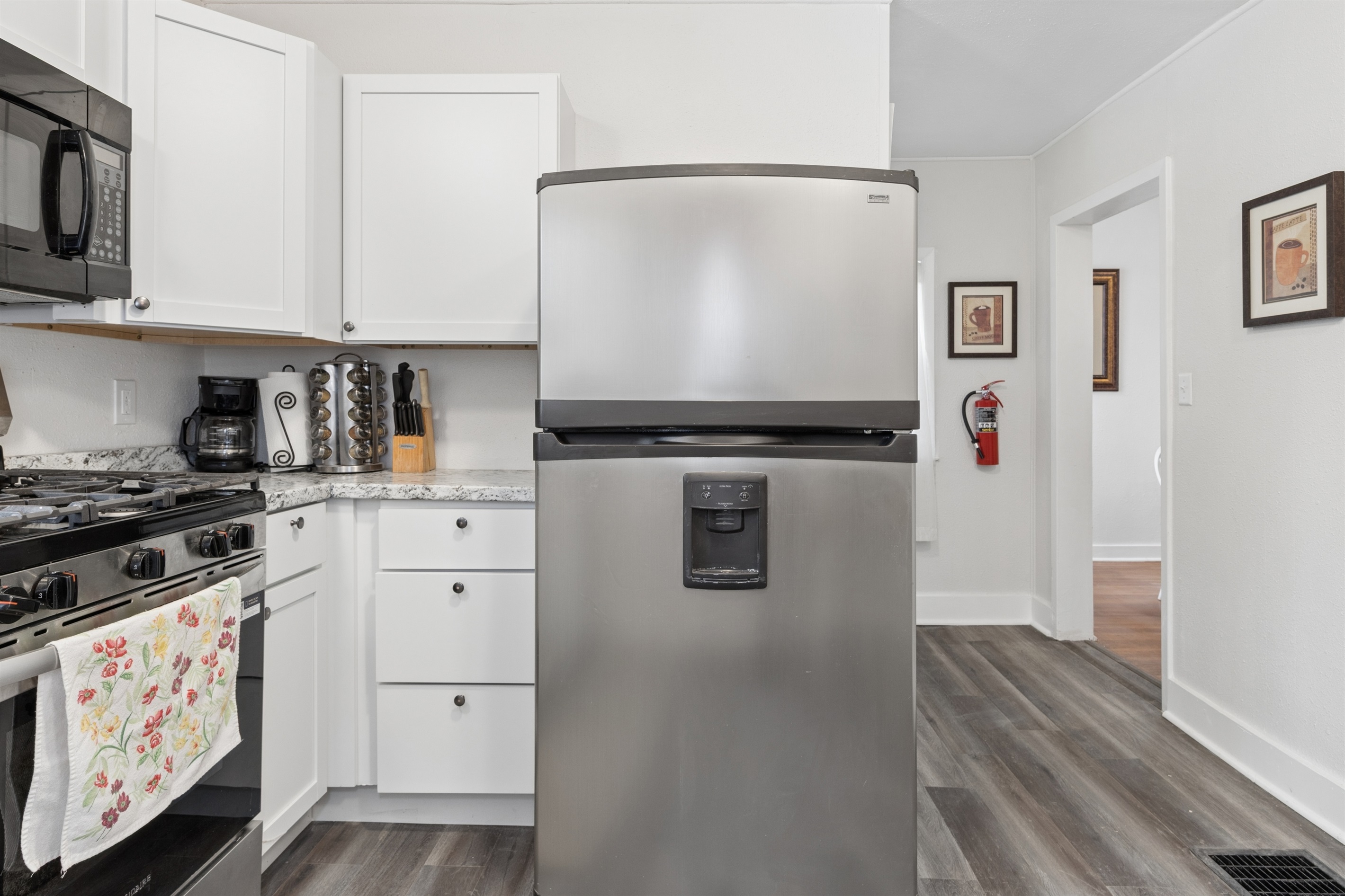 The kitchen flows into the dining room.