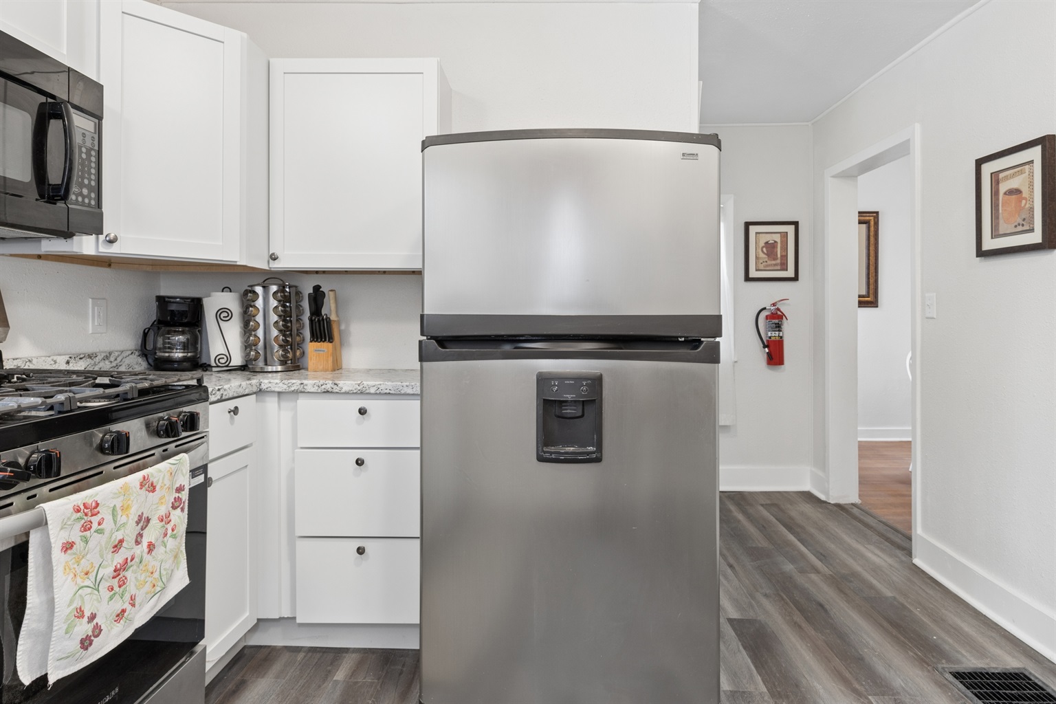 The kitchen flows into the dining room.