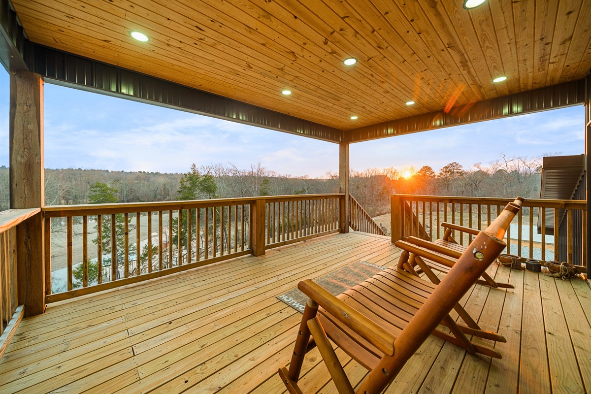 The upper deck provides sweeping views and a peaceful setting for morning coffee or sunset conversations.