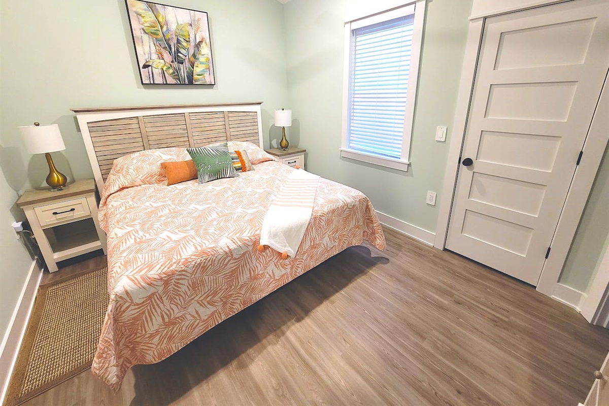 Master bedroom has high cathedral ceilings with lots of natural light. 