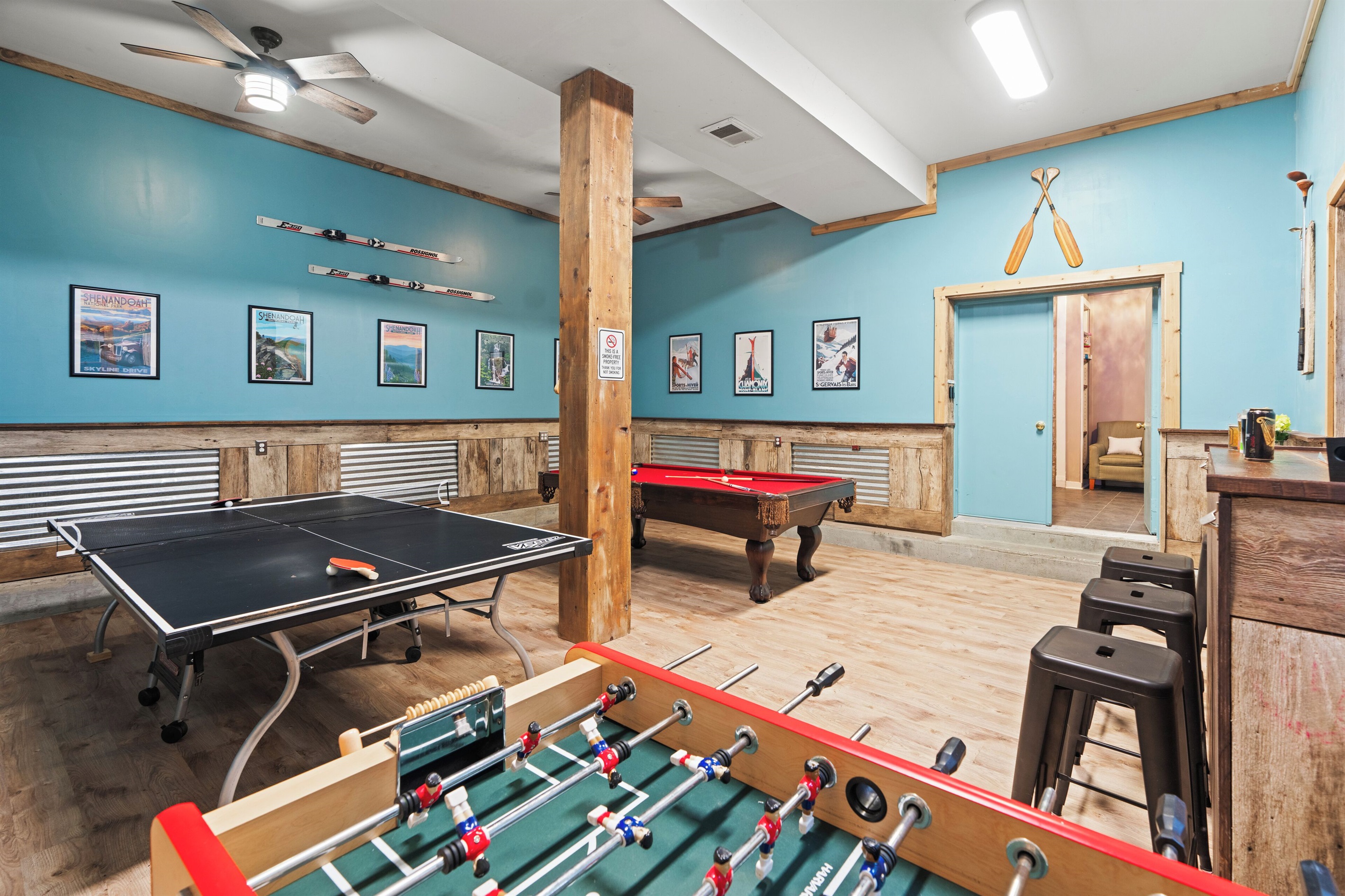 Game room with pool, ping pong, and foosball
