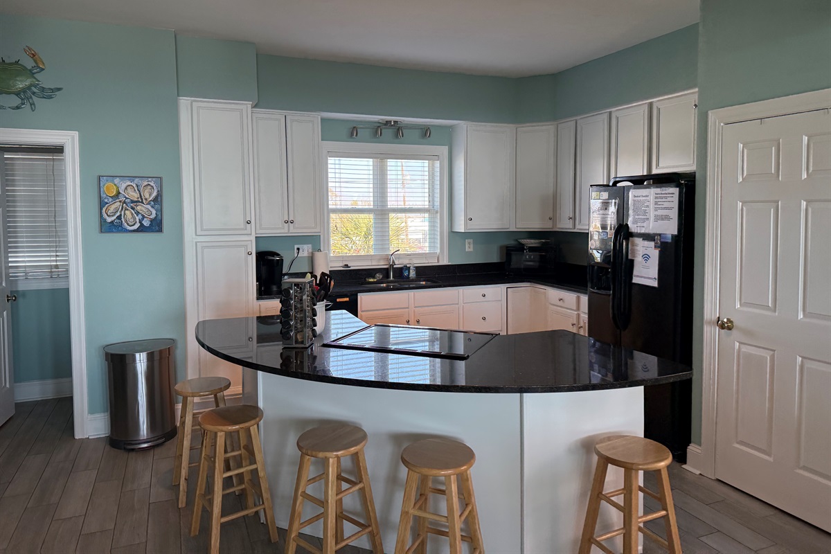 Fully Stocked Kitchen with Island Seating for 4