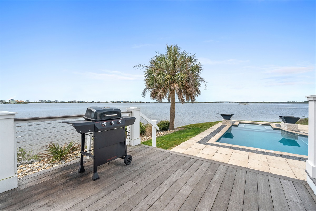 Grill and entertain outdoors with the pool and waterway just steps away