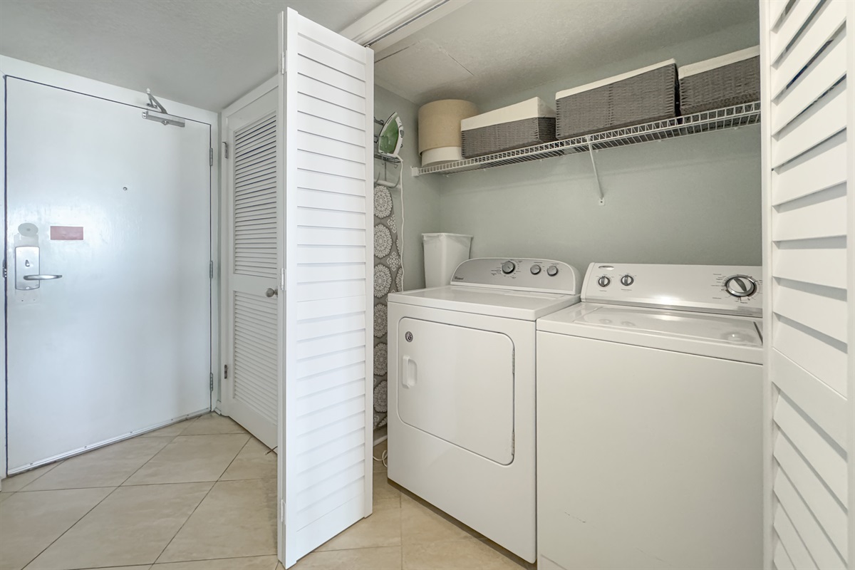 This well-equipped utility closet offers ample storage and a in-unit washer/dryer for your everyday needs.