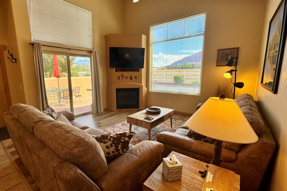 Spacious living area with leather sofas and huge views!