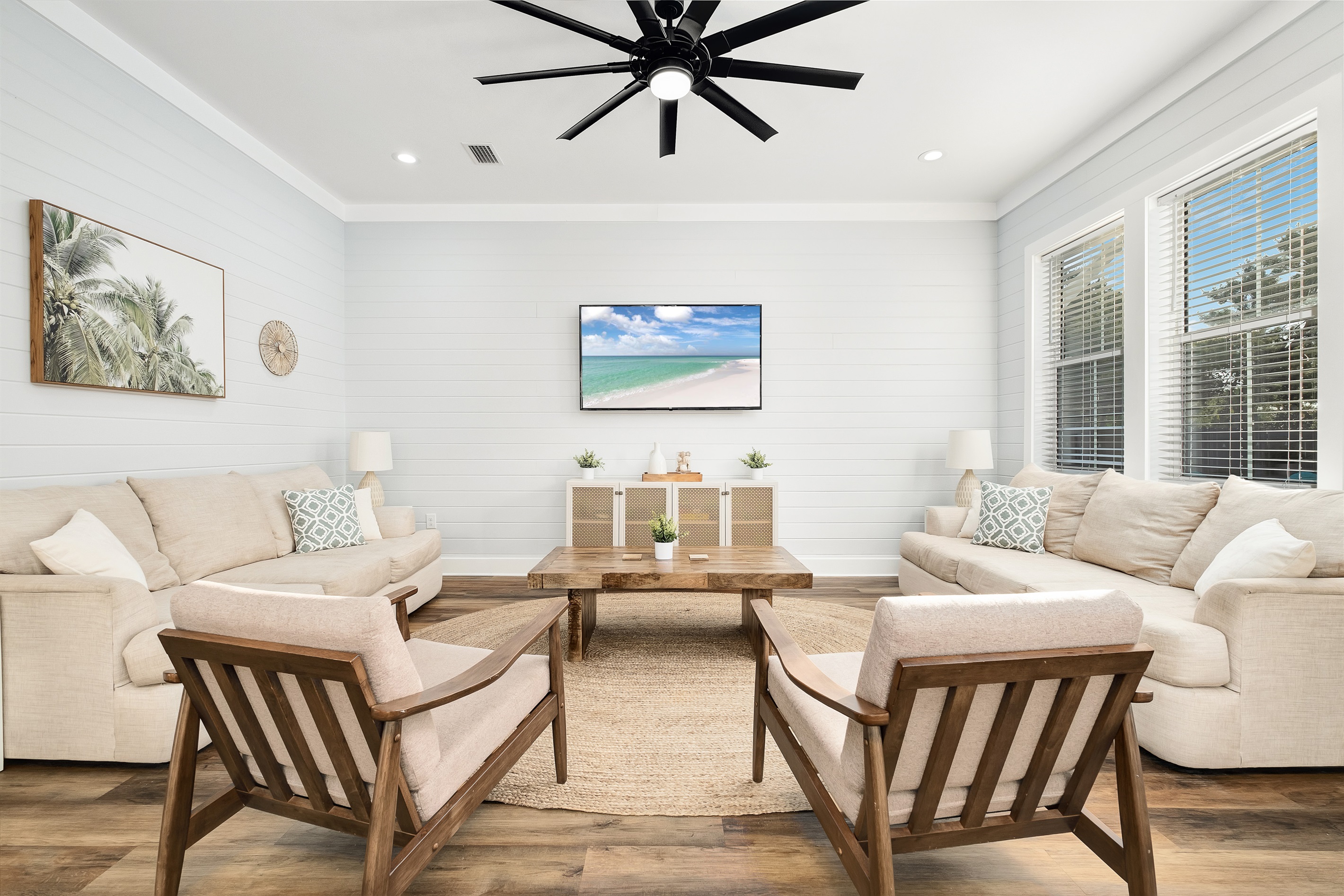 Bright and airy living space with beach-inspired decor, perfect for lounging after a day at Miramar Beach's pristine shores.