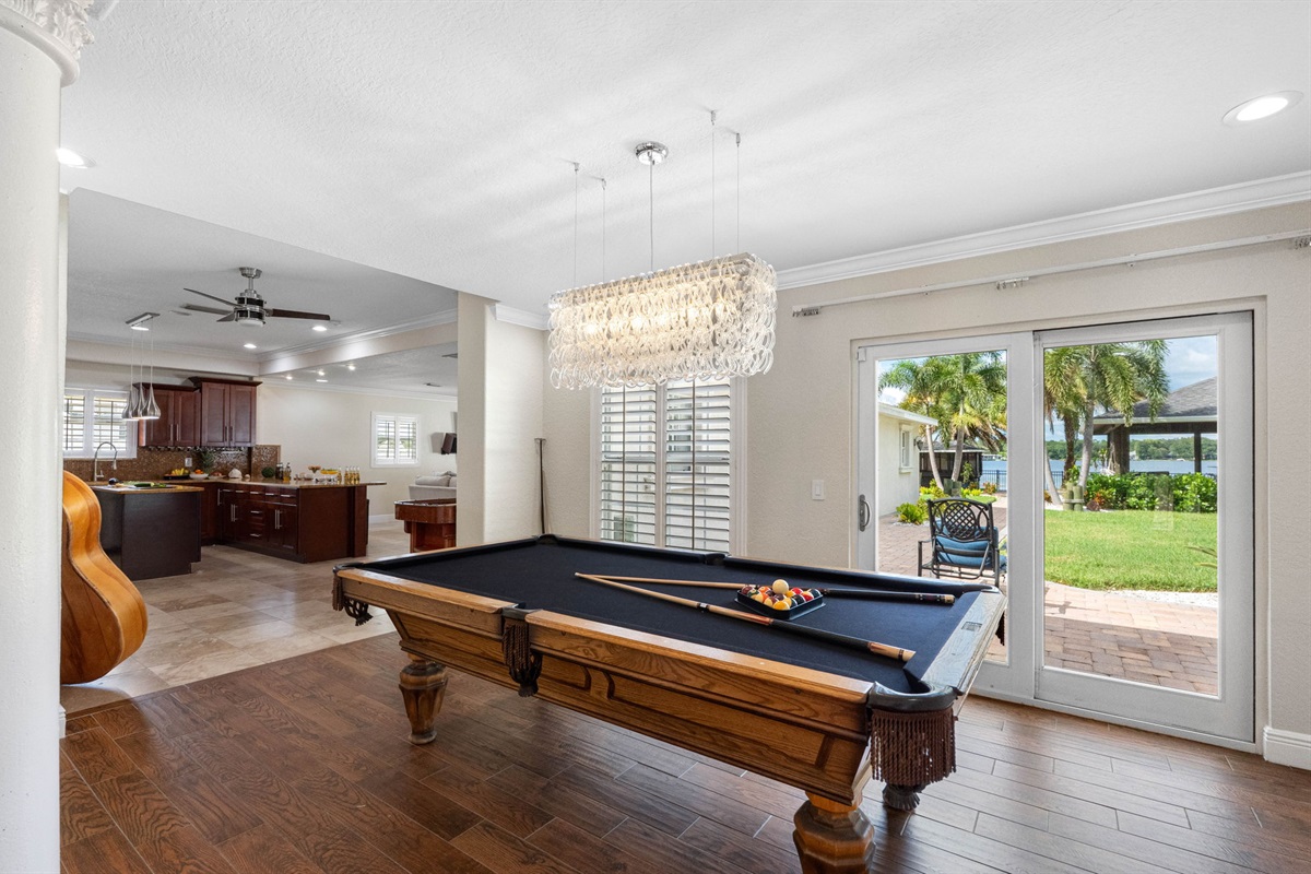 At the center of this fun-filled space is a full-size pool table, ready for everything from casual practice shots to exciting tournaments with family and friends.