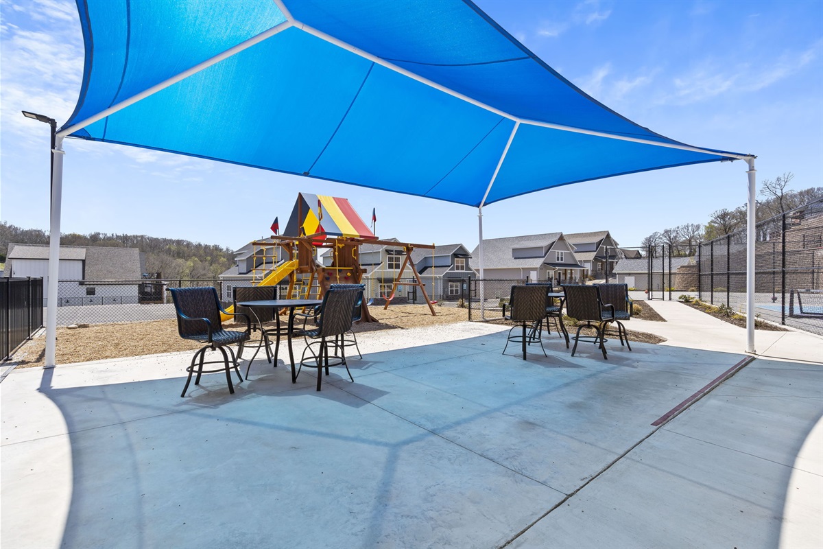 Children's Play Area & Covered Tables & Chairs