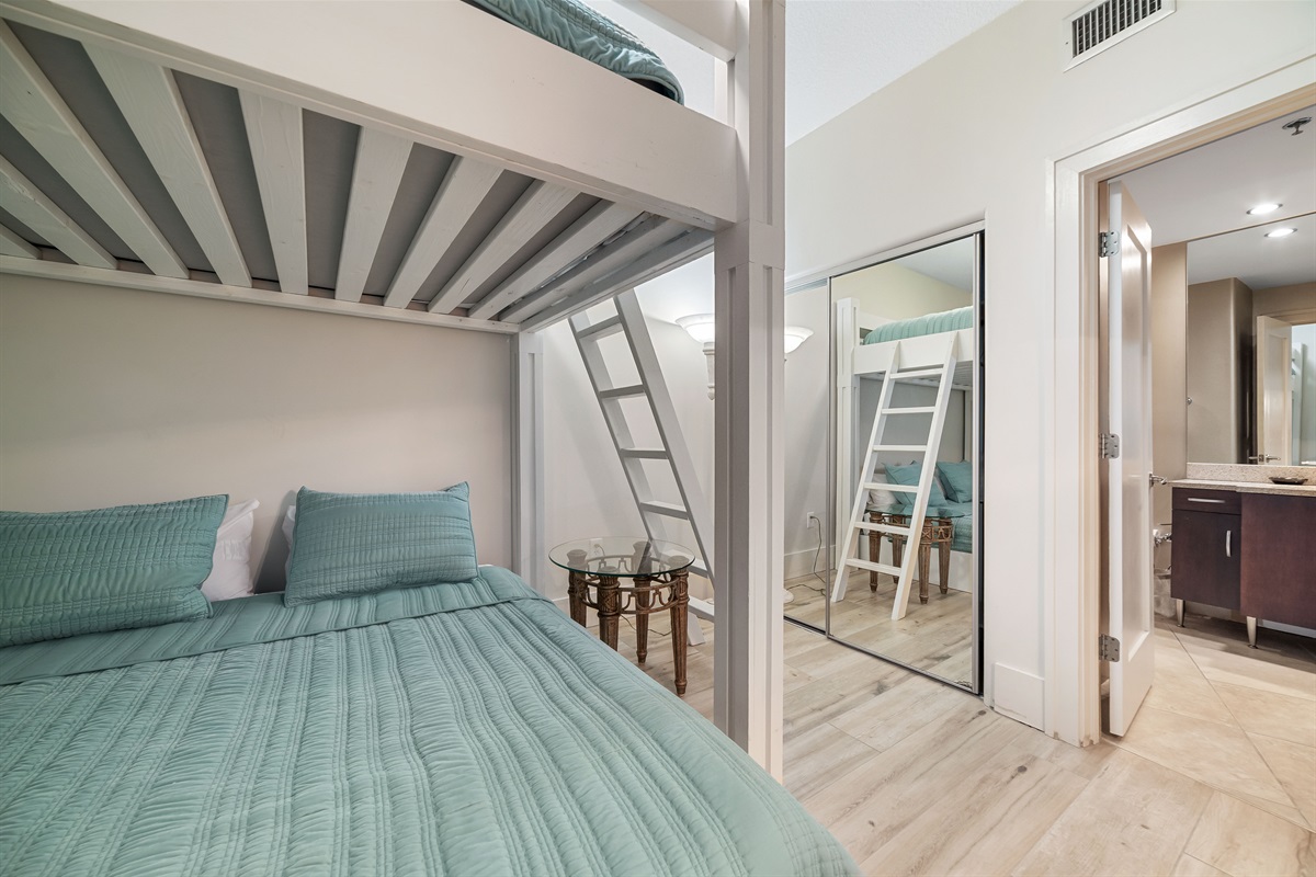Maximize your space with these cozy built-in bunk beds, providing extra sleeping arrangements for your guests.
